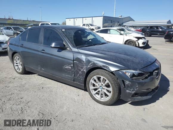 2016 BMW 3 Series 320i with VIN WBA8E1G59GNT34761, listed as a Copart auction lot 69047285 with 162,279 mi miles and Salvage title. Bid and sale history available at DreamBid. Image 4.
