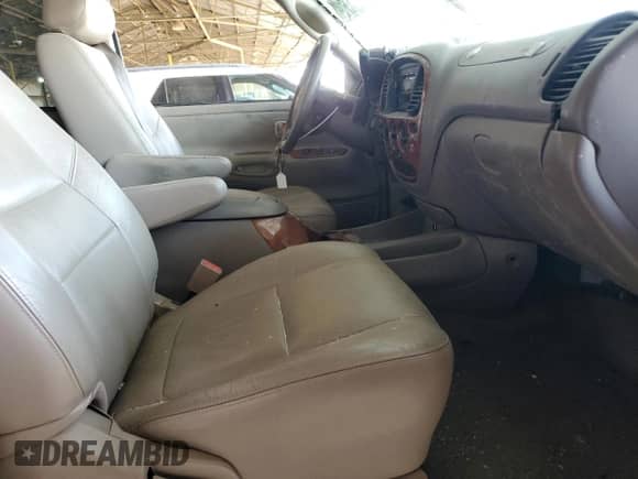 2003 Toyota Tundra Limited z VIN 5TBRT38153S370187, wystawiony jako Copart lot #53190885 z przebiegiem 164 846 mil mil oraz Szkoda całkowita • Salvage title. Historia ofert i sprzedaży dostępna na DreamBid. Obrazek 7.