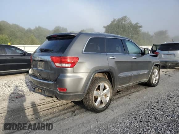 2011 Jeep Grand Cherokee Overland Summit with VIN 1J4RR6GT2BC721061, listed as a Copart auction lot 81855595 with 150,556 mi miles and Salvage title. Bid and sale history available at DreamBid. Image 3.