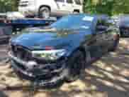 2019 BMW 5 Series 530i xDrive with VIN WBAJA7C55KG909845, listed as a IAAI auction lot 42793369 with 81,702 mi miles and . Bid and sale history available at DreamBid. Image 18.