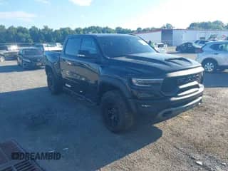 2021 Ram 1500 TRX z VIN 1C6SRFU97MN764907, wystawiony jako IAAI lot #43054936 z przebiegiem 24 806 mil mil oraz . Historia ofert i sprzedaży dostępna na DreamBid. Obrazek 1.