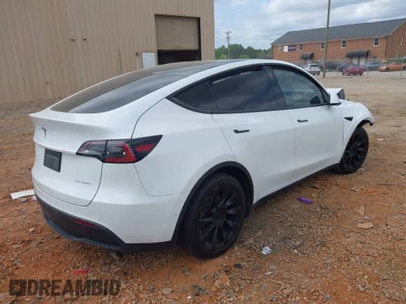 2022 Tesla Model Y Long Range z VIN 7SAYGDEE2NF385910, wystawiony jako IAAI lot #42146793 z przebiegiem 67 604 mil mil oraz . Historia ofert i sprzedaży dostępna na DreamBid. Obrazek 4.