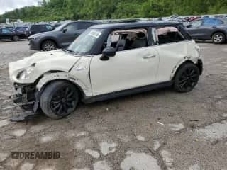 2018 MINI Hardtop Cooper S с VIN WMWXP7C53J2A46874, выставлен на аукционе Copart как лот 55066185 с пробегом 126 585 миль миль и Списание • Salvage title. История ставок и продаж доступна на DreamBid. Изображение 1.