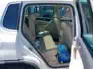 2013 Volkswagen Tiguan S z VIN WVGBV3AX0DW060270, wystawiony jako IAAI lot #42703723 z przebiegiem 96 922 mil mil oraz . Historia ofert i sprzedaży dostępna na DreamBid. Obrazek 8.