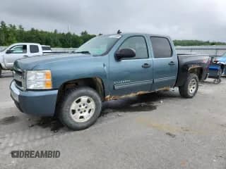 2010 Chevrolet Silverado 1500 LS with VIN 3GCRKREA5AG128965, listed as a Copart auction lot 61016495 with 156,037 mi miles and Clean title. Bid and sale history available at DreamBid. Image 1.