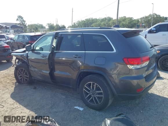 2020 Jeep Grand Cherokee Altitude with VIN 1C4RJFAG6LC325970, listed as a IAAI auction lot 42199817 with 51,259 mi miles and . Bid and sale history available at DreamBid. Image 14.