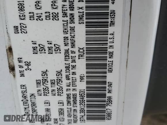 2002 Dodge Dakota Sport z VIN 1B7HL38X12S640531, wystawiony jako Copart lot #81258775 z przebiegiem 210 552 mil mil oraz Szkoda całkowita • Salvage title. Historia ofert i sprzedaży dostępna na DreamBid. Obrazek 13.
