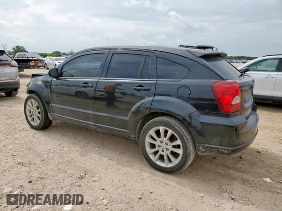 2011 Dodge Caliber Heat with VIN 1B3CB5HA2BD211411, listed as a Copart auction lot 65745415 with 138,648 mi miles and Salvage title. Bid and sale history available at DreamBid. Image 2.