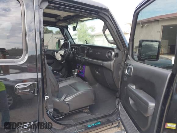 2022 Jeep Wrangler Unlimited Sport S with VIN 1C4HJXDG7NW195681, listed as a IAAI auction lot 43256297 with 48,954 mi miles and . Bid and sale history available at DreamBid. Image 5.