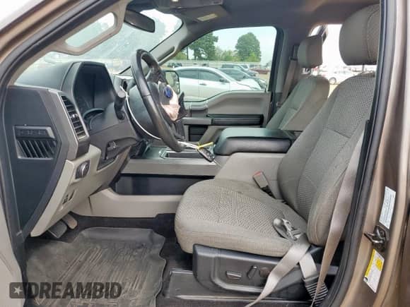 2019 Ford F-150 XLT z VIN 1FTEW1E47KKE61032, wystawiony jako Copart lot #84583325 z przebiegiem 90 095 mil mil oraz Szkoda całkowita • Salvage title. Historia ofert i sprzedaży dostępna na DreamBid. Obrazek 7.