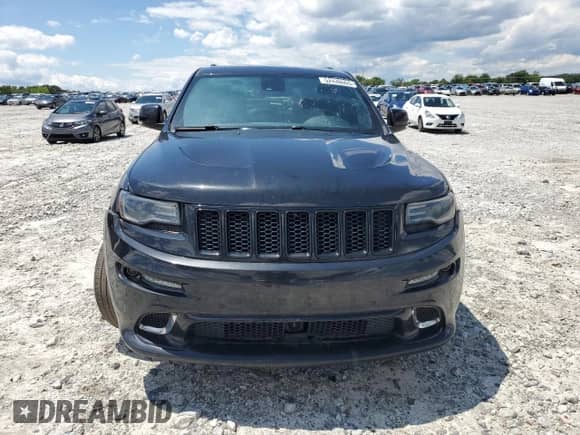 2014 Jeep Grand Cherokee SRT-8 z VIN 1C4RJFDJXEC518178, wystawiony jako Copart lot #52430005 z przebiegiem 127 298 mil mil oraz Szkoda całkowita • Salvage title. Historia ofert i sprzedaży dostępna na DreamBid. Obrazek 5.