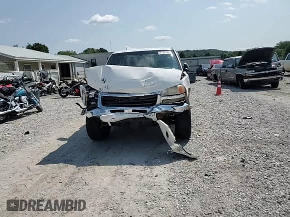 2004 GMC Sierra 1500 SLE z VIN 1GTEK19V44Z328527, wystawiony jako Copart lot #71717325 z przebiegiem Nie podano mil oraz Czysty tytuł • Clean title. Historia ofert i sprzedaży dostępna na DreamBid. Obrazek 13.