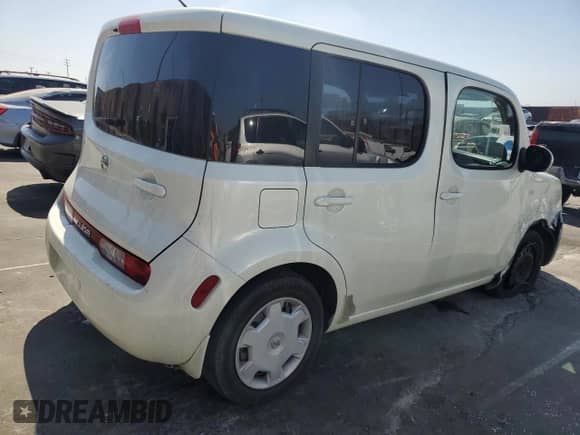2010 Nissan Cube S Krom Edition z VIN JN8AZ2KR3AT156488, wystawiony jako Copart lot #69114295 z przebiegiem 90 461 mil mil oraz Szkoda całkowita • Salvage title. Historia ofert i sprzedaży dostępna na DreamBid. Obrazek 3.