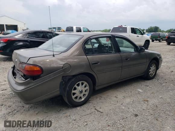 1999 Chevrolet Malibu LS с VIN 1G1NE52M2X6144170, выставлен на аукционе Copart как лот 62370795 с пробегом 144 447 миль миль и Списание • Salvage title. История ставок и продаж доступна на DreamBid. Изображение 3.