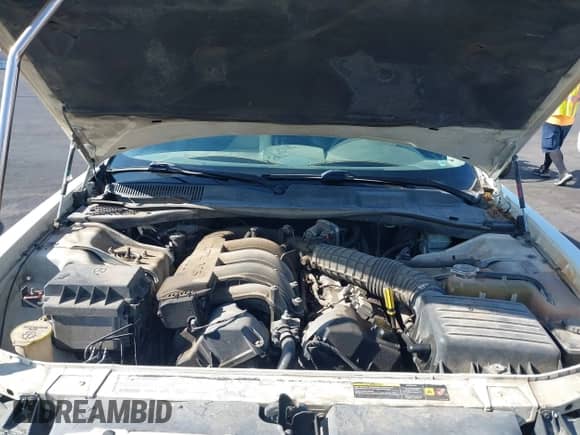 2005 Chrysler 300 300 z VIN 2C3JA43R05H593661, wystawiony jako IAAI lot #42518947 z przebiegiem 246 260 mil mil oraz . Historia ofert i sprzedaży dostępna na DreamBid. Obrazek 10.