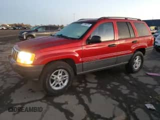 2002 Jeep Grand Cherokee Laredo with VIN 1J4GW48S72C221083, listed as a Copart auction lot 87283725 with 81,266 mi miles and Clean title. Bid and sale history available at DreamBid. Image 1.