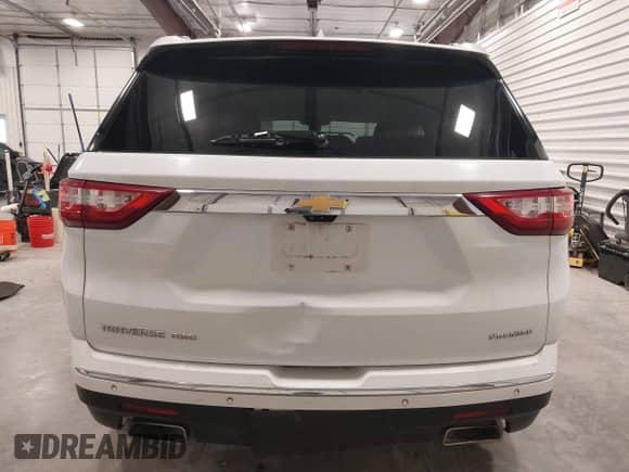 2021 Chevrolet Traverse Premier with VIN 1GNEVKKW7MJ218772, listed as a IAAI auction lot 42306743 with 106,898 mi miles and . Bid and sale history available at DreamBid. Image 16.