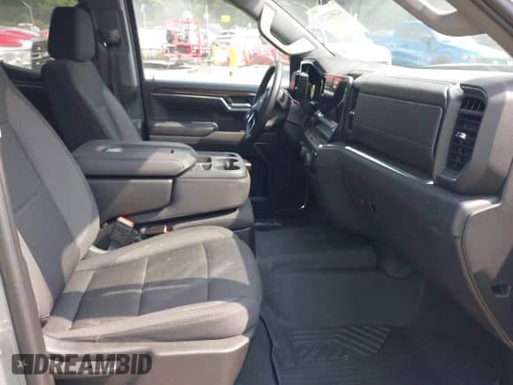 2023 Chevrolet Silverado 1500 LT with VIN 1GCRDDED4PZ296449, listed as a IAAI auction lot 42402216 with 15,540 mi miles and . Bid and sale history available at DreamBid. Image 5.