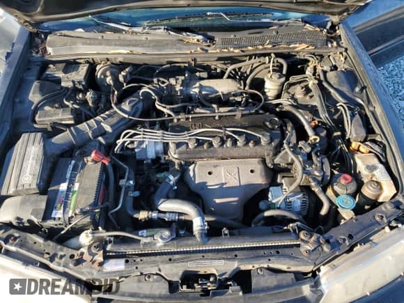 1994 Honda Accord EX z VIN 1HGCD5666RA025696, wystawiony jako Copart lot #82838644 z przebiegiem 269 181 mil mil oraz Szkoda całkowita • Salvage title. Historia ofert i sprzedaży dostępna na DreamBid. Obrazek 13.