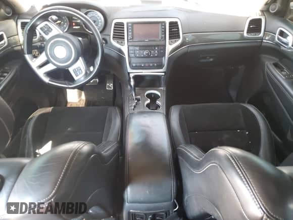 2012 Jeep Grand Cherokee SRT-8 z VIN 1C4RJFDJ9CC346187, wystawiony jako Copart lot #52351105 z przebiegiem 120 018 mil mil oraz Szkoda całkowita • Salvage title. Historia ofert i sprzedaży dostępna na DreamBid. Obrazek 8.