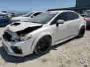 2016 Subaru WRX Premium with VIN JF1VA1E61G8823463, listed as a Copart auction lot 61030575 with 86,580 mi miles and Salvage title. Bid and sale history available at DreamBid. Image 1.