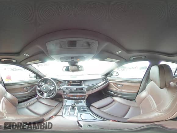 2016 BMW 5 Series 550i xDrive with VIN WBAKP9C55GD981149, listed as a Copart auction lot 65976265 with 121,838 mi miles and Salvage title. Bid and sale history available at DreamBid. Image 14.