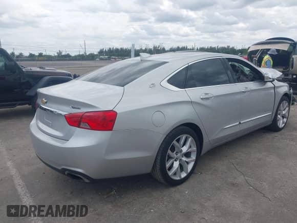 2020 Chevrolet Impala Premier with VIN 1G1105S35LU112811, listed as a IAAI auction lot 42178643 with 98,767 mi miles and . Bid and sale history available at DreamBid. Image 4.