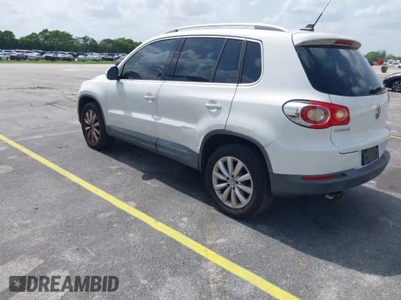 2011 Volkswagen Tiguan S with VIN WVGAV7AX9BW514225, listed as a IAAI auction lot 42461785 with 128,973 mi miles and . Bid and sale history available at DreamBid. Image 3.