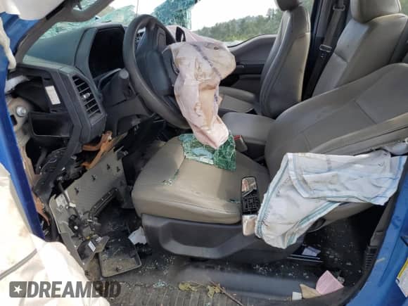 2016 Ford F-150 XL with VIN 1FTMF1E87GKD28437, listed as a Copart auction lot 69589455 with 111,251 mi miles and Salvage title. Bid and sale history available at DreamBid. Image 7.