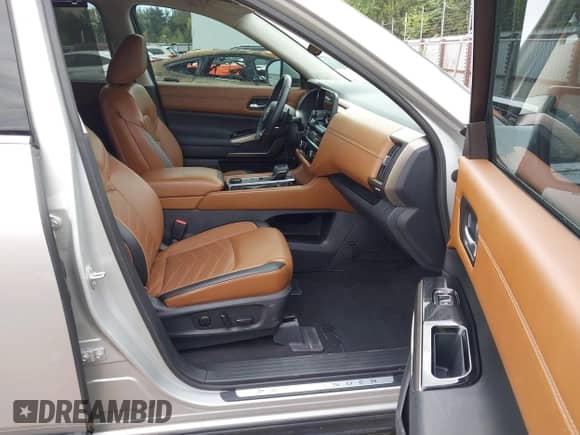 2023 Nissan Pathfinder Platinum with VIN 5N1DR3DK8PC228837, listed as a IAAI auction lot 43173190 with 59,871 mi miles and . Bid and sale history available at DreamBid. Image 5.