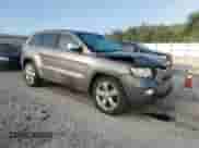 2011 Jeep Grand Cherokee Overland Summit with VIN 1J4RR6GT2BC721061, listed as a Copart auction lot 81855595 with 150,556 mi miles and Salvage title. Bid and sale history available at DreamBid. Image 4.