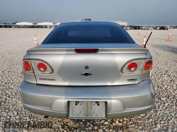 2000 Chevrolet Cavalier with VIN 1G1JC1243Y7363101, listed as a Copart auction lot 57591485 with 252,742 mi miles and Salvage title. Bid and sale history available at DreamBid. Image 6.