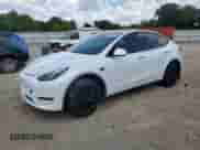 2023 Tesla Model Y Long Range with VIN 7SAYGDEE5PF690904, listed as a Copart auction lot 67058755 with 27,914 mi miles and Salvage title. Bid and sale history available at DreamBid. Image 1.