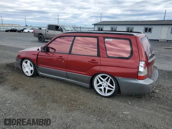 2007 Subaru Forester X L.L. Bean with VIN JF1SG67607H718232, listed as a Copart auction lot 69377505 with 182,019 mi miles and Clean title. Bid and sale history available at DreamBid. Image 2.