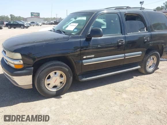 2003 Chevrolet Tahoe LT z VIN 1GNEC13Z03R318933, wystawiony jako IAAI lot #41828148 z przebiegiem 192 851 mil mil oraz . Historia ofert i sprzedaży dostępna na DreamBid. Obrazek 2.