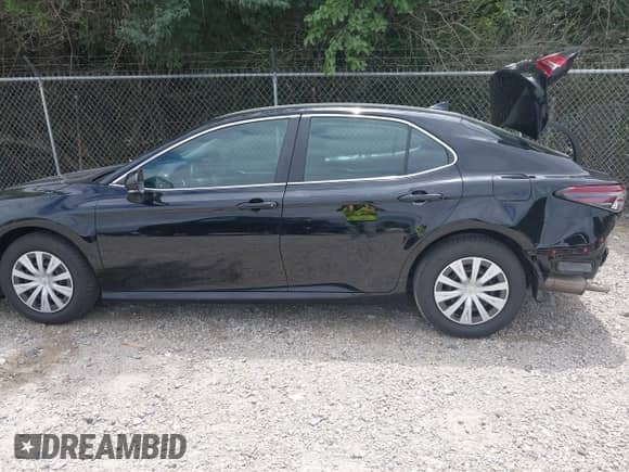 2022 Toyota Camry Hybrid LE with VIN 4T1C31AK3NU574937, listed as a IAAI auction lot 43038140 with 50,708 mi miles and . Bid and sale history available at DreamBid. Image 15.