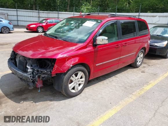 2008 Dodge Grand Caravan SXT with VIN 2D8HN54XX8R147955, listed as a IAAI auction lot 42740986 with 107,816 mi miles and . Bid and sale history available at DreamBid. Image 2.