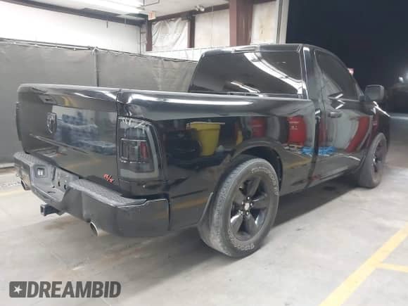 2014 Ram 1500 Express z VIN 3C6JR6AT5EG142019, wystawiony jako IAAI lot #42909966 z przebiegiem 136 943 mil mil oraz . Historia ofert i sprzedaży dostępna na DreamBid. Obrazek 4.