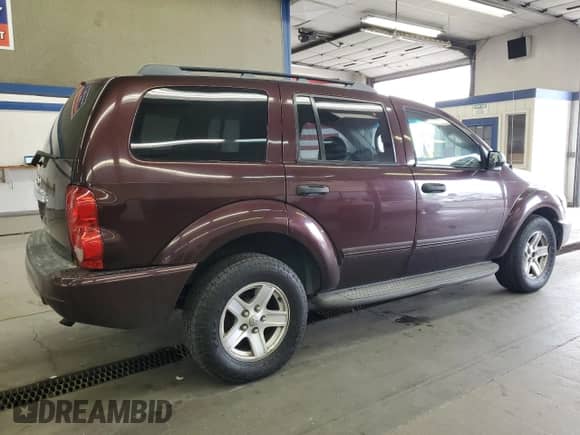 2004 Dodge Durango SLT z VIN 1D4HB48N84F193685, wystawiony jako Copart lot #82458985 z przebiegiem 244 694 mil mil oraz Szkoda całkowita • Salvage title. Historia ofert i sprzedaży dostępna na DreamBid. Obrazek 3.