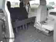 2013 Dodge Grand Caravan SXT with VIN 2C4RDGCG8DR654835, listed as a IAAI auction lot 43434902 with 167,017 mi miles and . Bid and sale history available at DreamBid. Image 8.