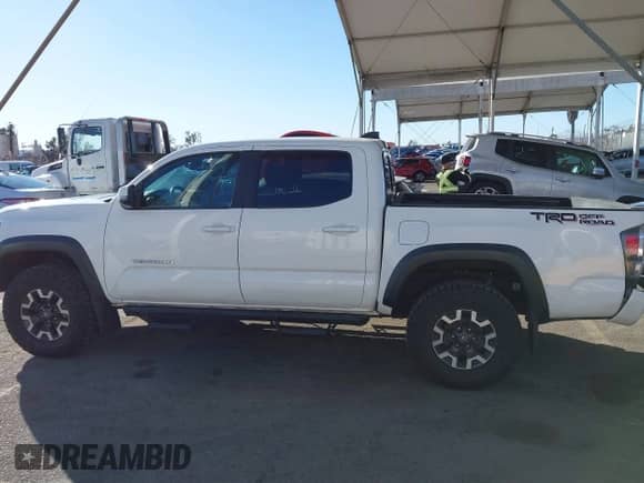 2021 Toyota Tacoma SR5 с VIN 3TMAZ5CN7MM144212, выставлен на аукционе IAAI как лот 41286049 с пробегом 75 113 миль миль и . История ставок и продаж доступна на DreamBid. Изображение 14.