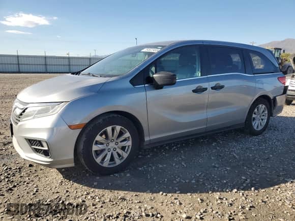 2018 Honda Odyssey LX with VIN 5FNRL6H22JB100093, listed as a Copart auction lot 84522455 with 260,624 mi miles and Salvage title. Bid and sale history available at DreamBid. Image 1.