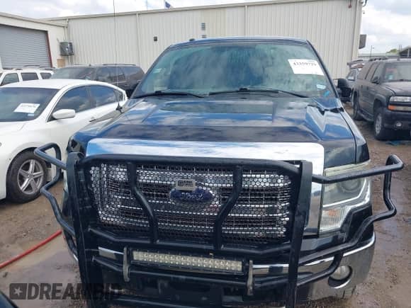 2014 Ford F-150 XLT with VIN 1FTFW1EF9EKD51674, listed as a IAAI auction lot 43359729 with 223,352 mi miles and . Bid and sale history available at DreamBid. Image 12.