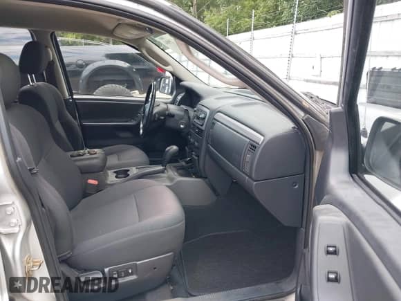 2002 Jeep Grand Cherokee с VIN 1J4GX38S92C237261, выставлен на аукционе IAAI как лот 42923904 с пробегом 112 640 миль миль и . История ставок и продаж доступна на DreamBid. Изображение 5.