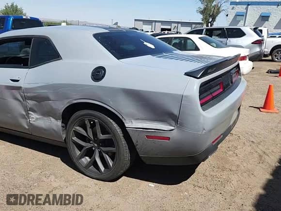 2021 Dodge Challenger SXT с VIN 2C3CDZAG1MH582424, выставлен на аукционе Copart как лот 70219745 с пробегом 64 465 миль миль и Списание • Salvage title. История ставок и продаж доступна на DreamBid. Изображение 13.