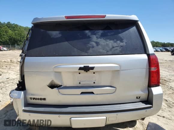 2018 Chevrolet Tahoe LT z VIN 1GNSKBKCXJR279452, wystawiony jako Copart lot #70432215 z przebiegiem 181 834 mil mil oraz Szkoda całkowita • Salvage title. Historia ofert i sprzedaży dostępna na DreamBid. Obrazek 6.