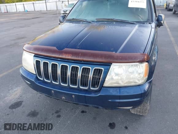 2002 Jeep Grand Cherokee Limited with VIN 1J4GW58N02C115476, listed as a IAAI auction lot 43394255 with Not provided miles and . Bid and sale history available at DreamBid. Image 6.