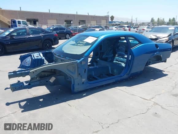 2022 Dodge Challenger R/T Scat Pack Widebody z VIN 2C3CDZFJ4NH118453, wystawiony jako IAAI lot #42604386 z przebiegiem Nie podano mil oraz . Historia ofert i sprzedaży dostępna na DreamBid. Obrazek 2.