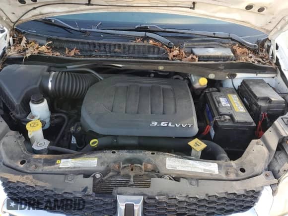 2012 Dodge Grand Caravan SE z VIN 2C4RDGBG4CR380789, wystawiony jako Copart lot #85951175 z przebiegiem 199 556 mil mil oraz Czysty tytuł • Clean title. Historia ofert i sprzedaży dostępna na DreamBid. Obrazek 12.