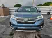 2021 Honda Pilot Touring 8-Passenger z VIN 5FNYF5H9XMB002282, wystawiony jako Copart lot #63672435 z przebiegiem 34 999 mil mil oraz Szkoda całkowita • Salvage title. Historia ofert i sprzedaży dostępna na DreamBid. Obrazek 5.